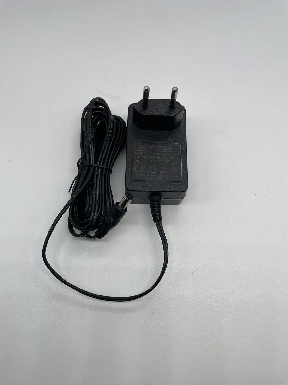 AC/ADAPT- SA-120200020 INPUT: 100-240V 50/60H2-07A Max OUTPUT: 12V = 2.0 A. 0-GA